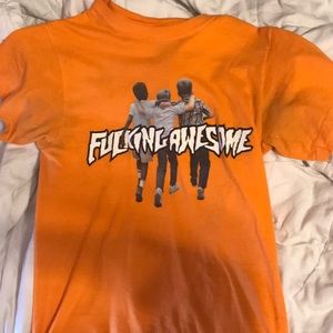“Fucking awesome” brand, orange shirt, size small